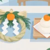 別々に置かれたしめ飾りと鏡餅